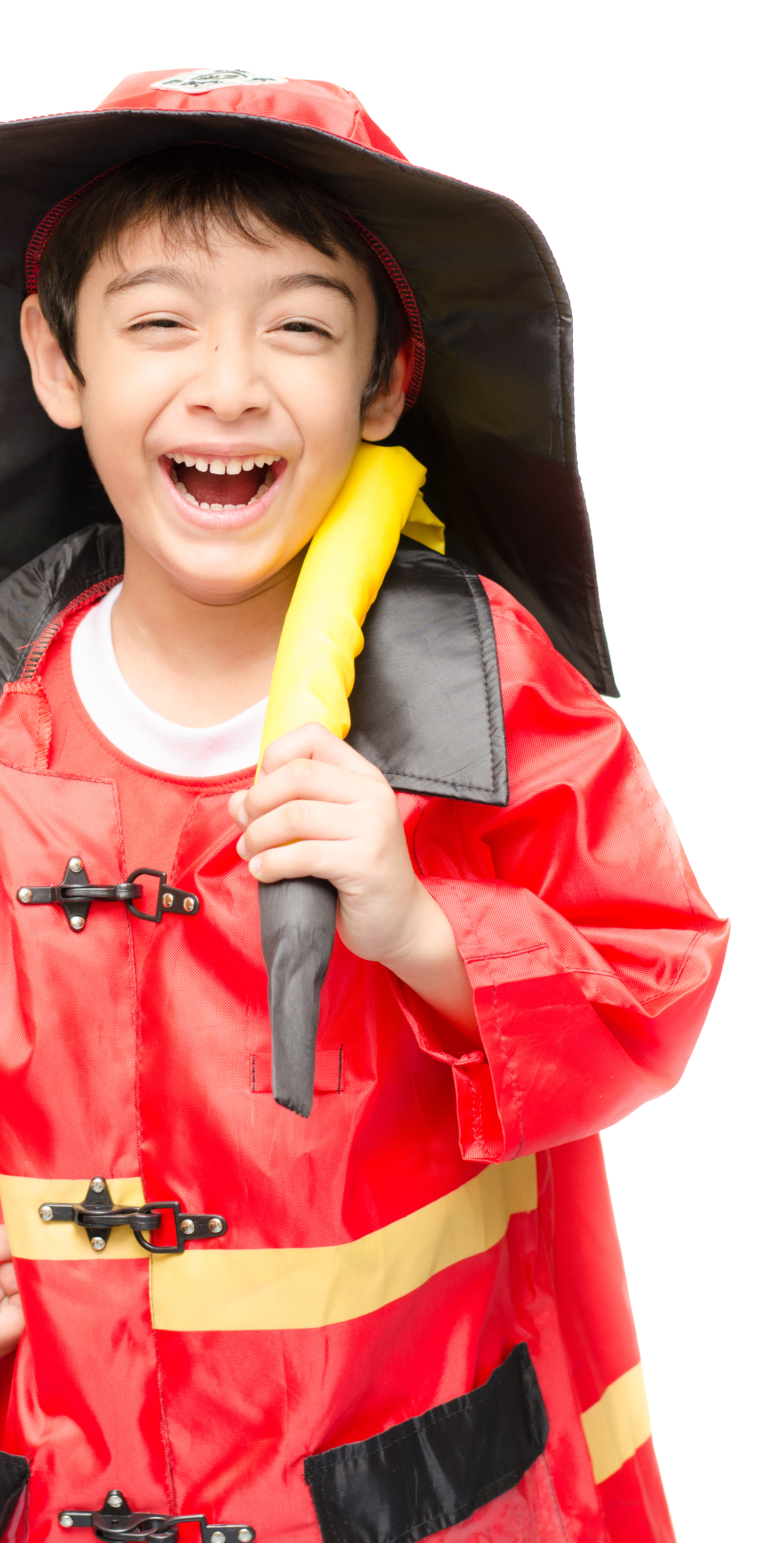 Young Asian boy wearing a firefighter costume, holding a hose over one shoulder, laughing at the camera.